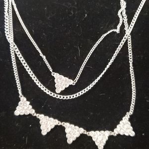Silvertone triple strand necklace